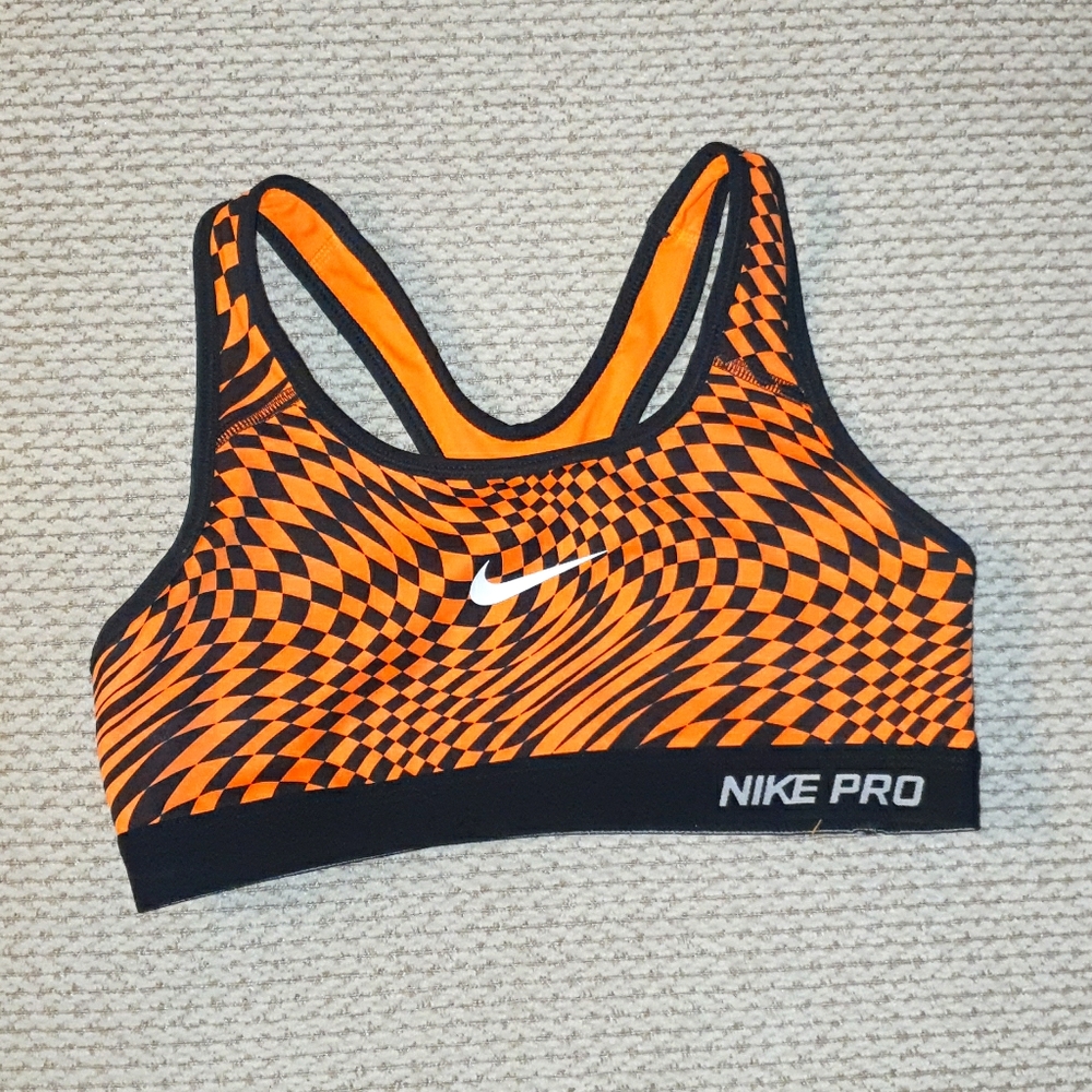 Nike Pro Sports bra. Orange & Blk print.